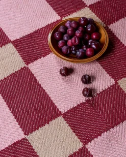 Layered Evelina Kroon Plum Punch Jute Rug